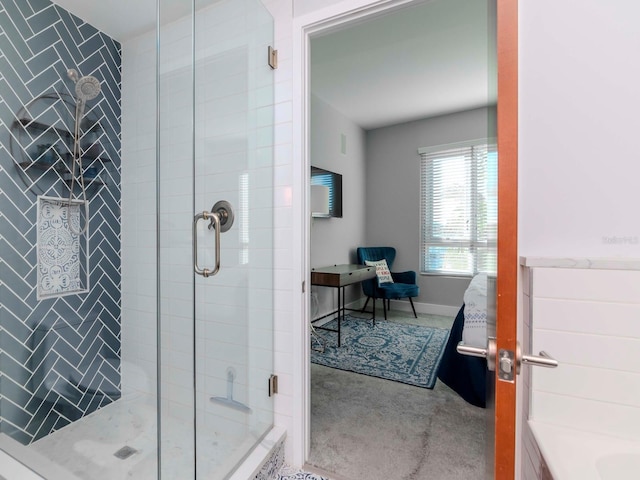 bathroom featuring an enclosed shower