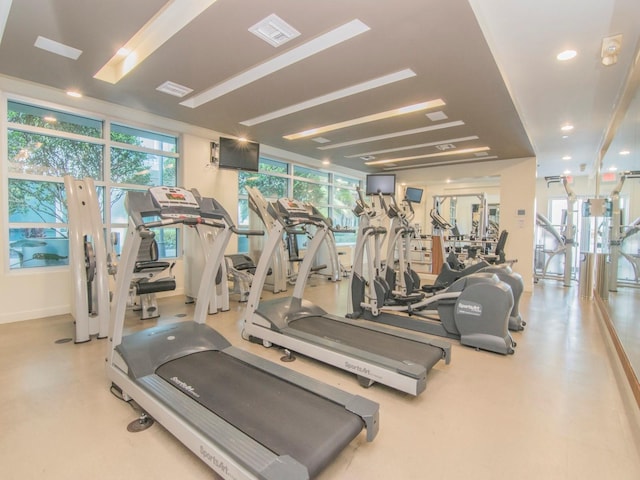 workout area featuring a wealth of natural light