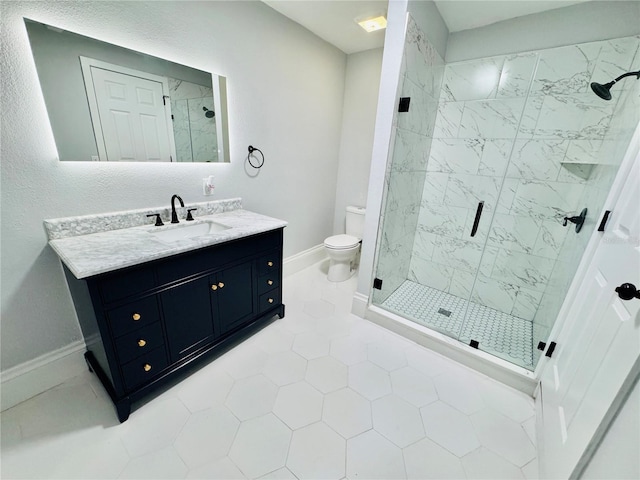 bathroom with tile patterned flooring, vanity, toilet, and a shower with door