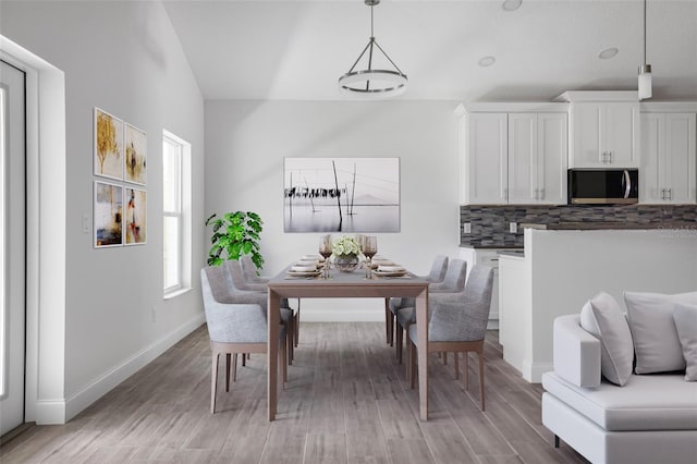 dining space featuring hardwood / wood-style floors