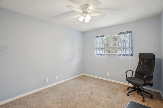 sitting room featuring carpet flooring and ceiling fan