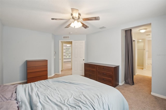 bedroom with ceiling fan and light carpet