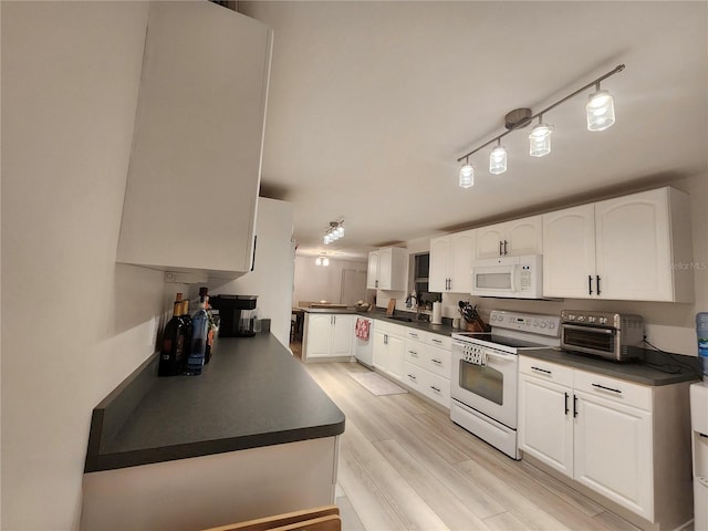 kitchen with white cabinetry, light wood-type flooring, white appliances, and sink