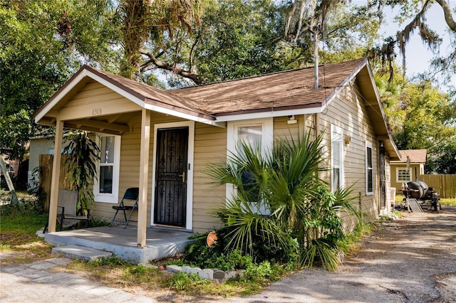 bungalow-style home with covered porch