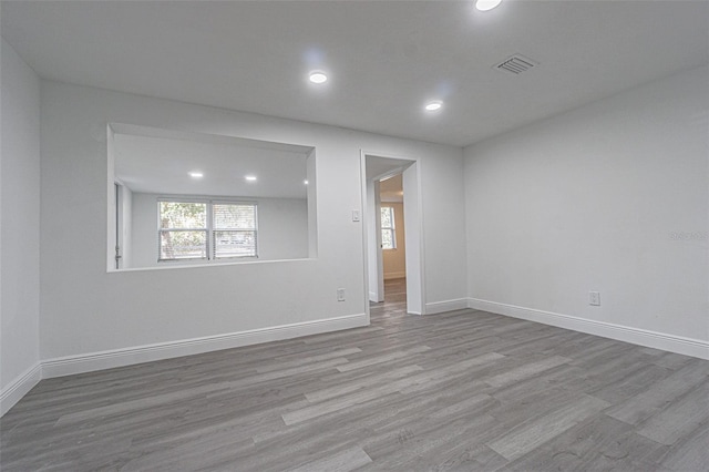 empty room with light wood-type flooring