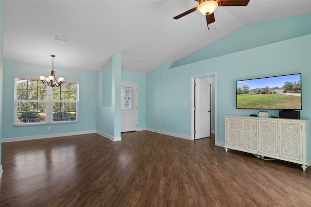 unfurnished living room with vaulted ceiling, ceiling fan with notable chandelier, and dark hardwood / wood-style floors