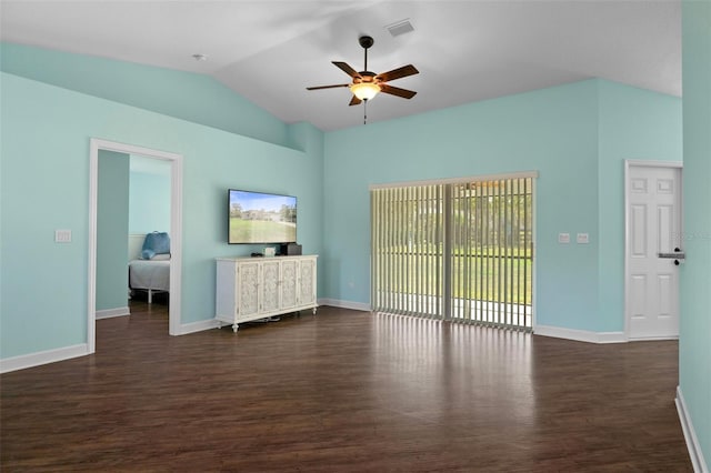 unfurnished living room featuring dark hardwood / wood-style floors, ceiling fan, and lofted ceiling