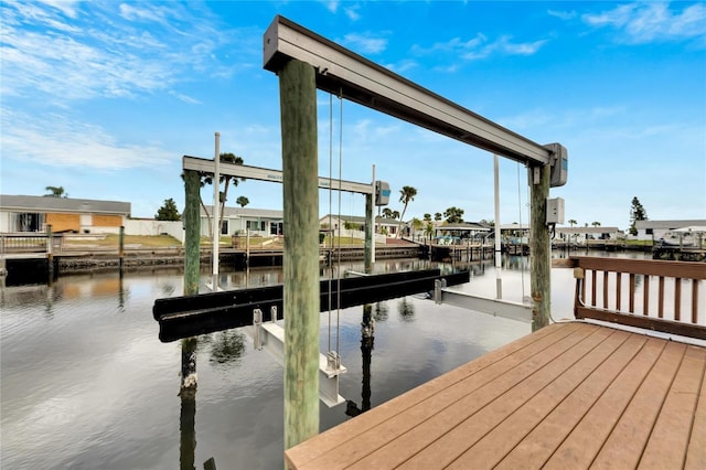 dock area with a water view