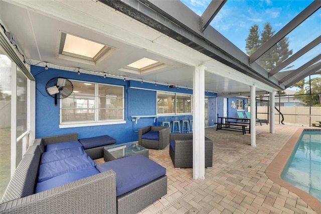 view of patio featuring an outdoor hangout area and a fenced in pool