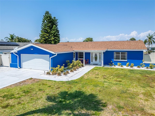 single story home with stucco siding, a front lawn, fence, concrete driveway, and a garage