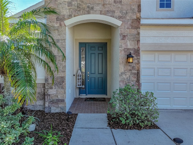 property entrance featuring a garage