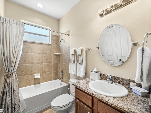 full bathroom with shower / tub combo, vanity, and toilet