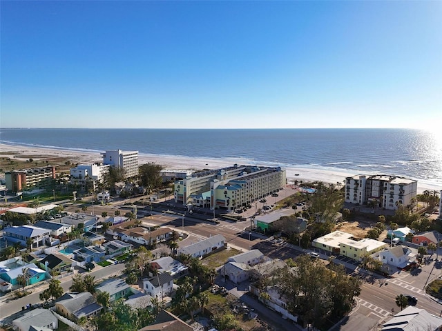 drone / aerial view featuring a view of the beach and a water view