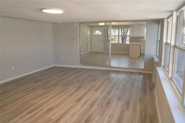 interior space with light hardwood / wood-style floors