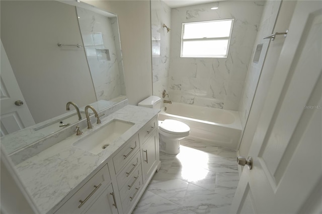 full bathroom with toilet, vanity, and tiled shower / bath