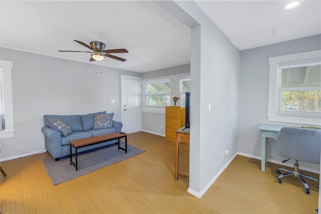 interior space with hardwood / wood-style flooring and ceiling fan