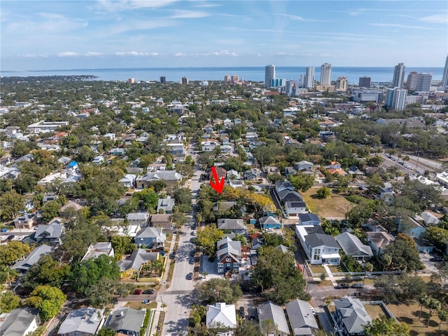 birds eye view of property featuring a water view