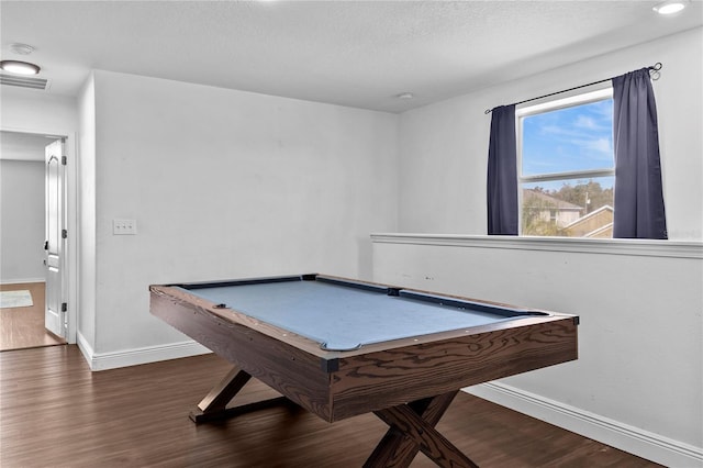 rec room with a textured ceiling, dark hardwood / wood-style flooring, and pool table