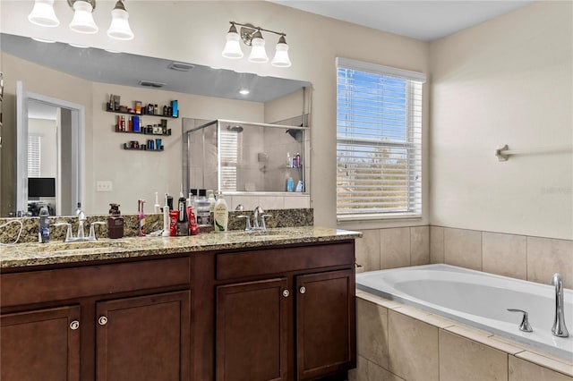 bathroom with vanity and plus walk in shower