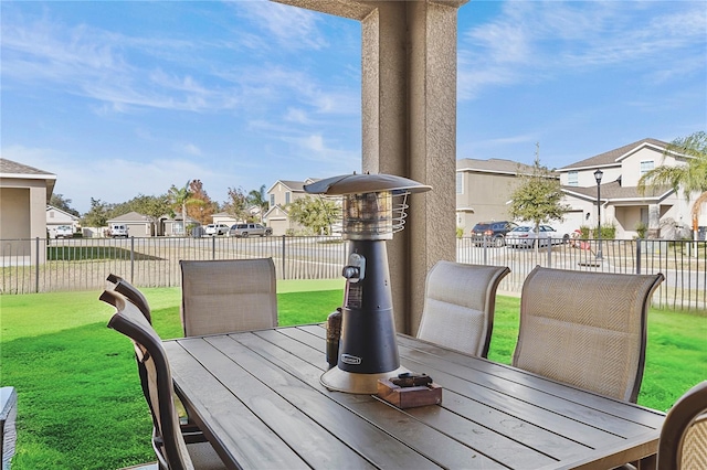 wooden terrace featuring a yard