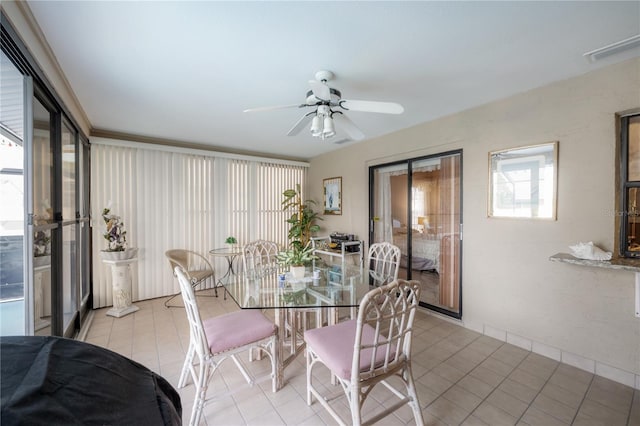 dining space with ceiling fan