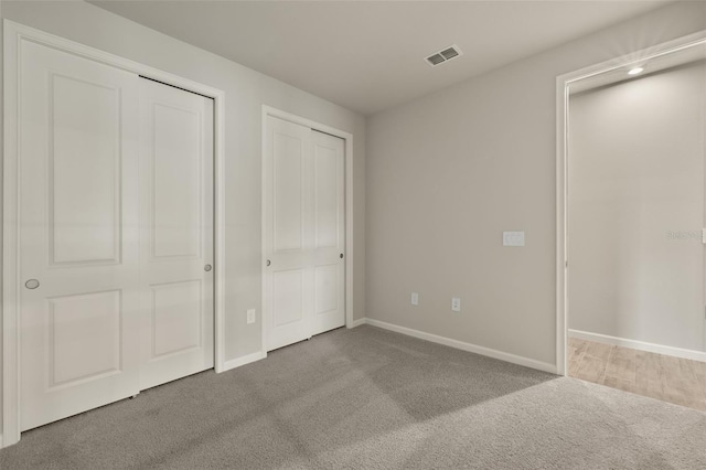 unfurnished bedroom featuring carpet floors