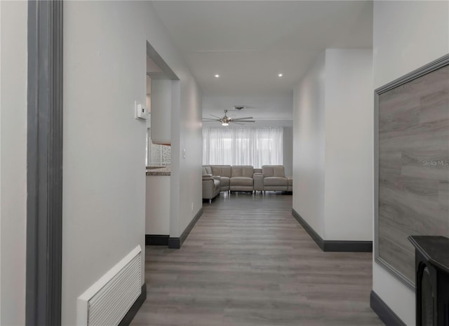 hallway featuring hardwood / wood-style floors