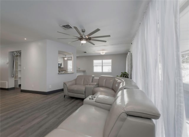 living room featuring dark wood-type flooring