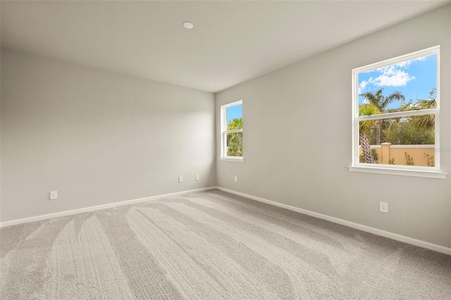 unfurnished room featuring carpet floors