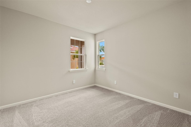 unfurnished room with carpet