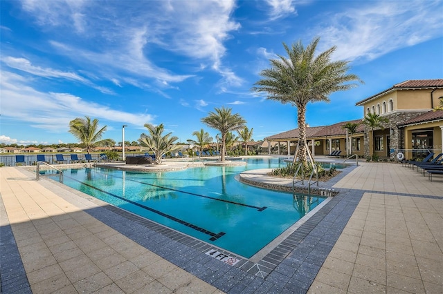 view of pool featuring a patio