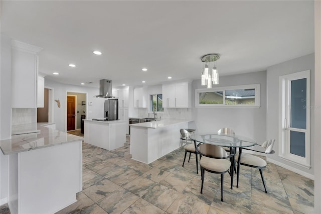 dining space featuring sink