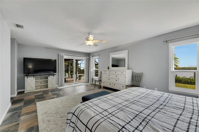 bedroom with access to outside and ceiling fan