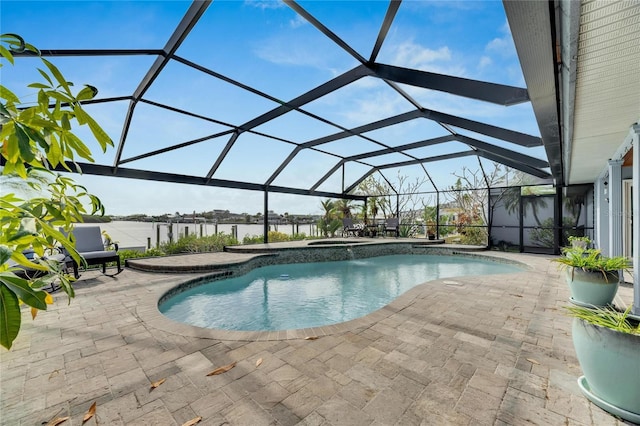 view of pool with a lanai and a patio area