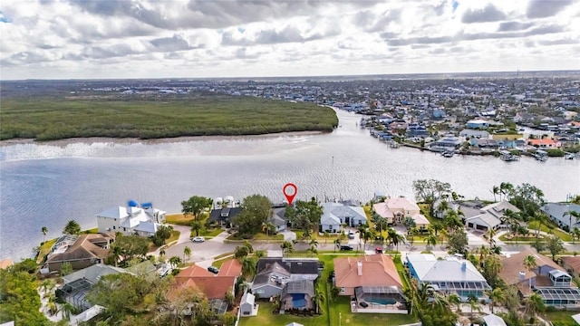 bird's eye view with a water view