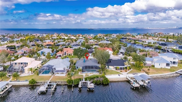 bird's eye view with a water view