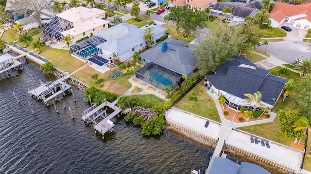 bird's eye view with a water view