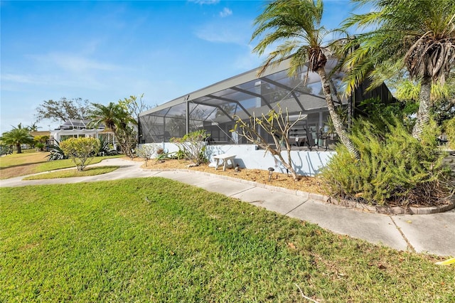 view of yard featuring a lanai