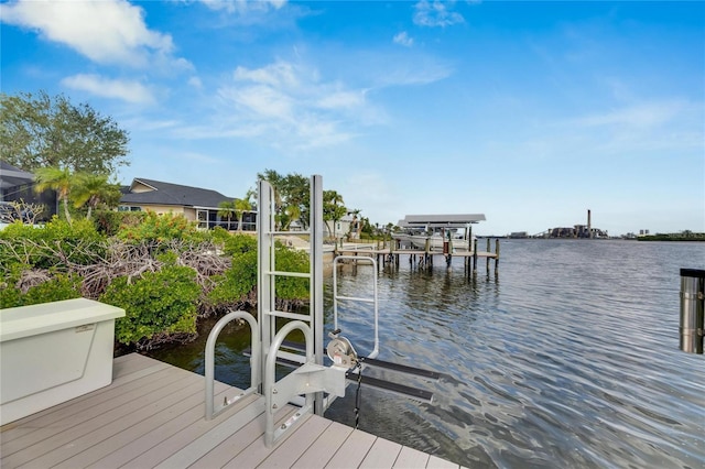 dock area with a water view