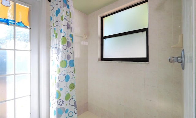 bathroom with a shower with shower curtain