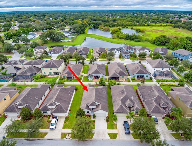 drone / aerial view featuring a water view