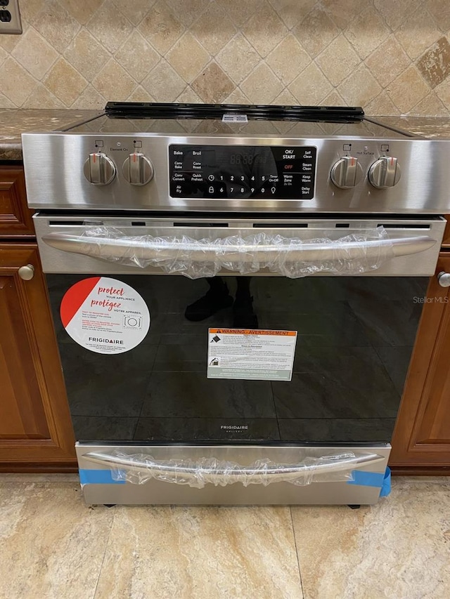 interior details with stainless steel range oven