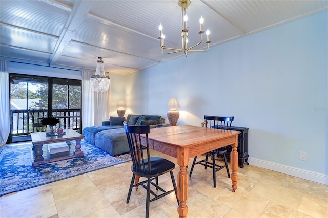 dining space with an inviting chandelier