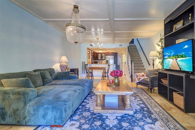 living room with a notable chandelier