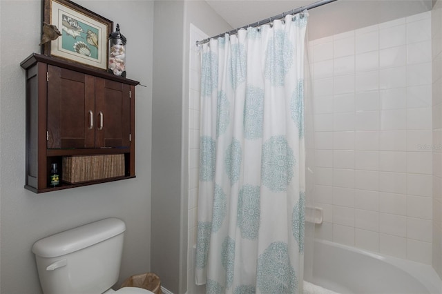 bathroom featuring toilet and shower / bath combo