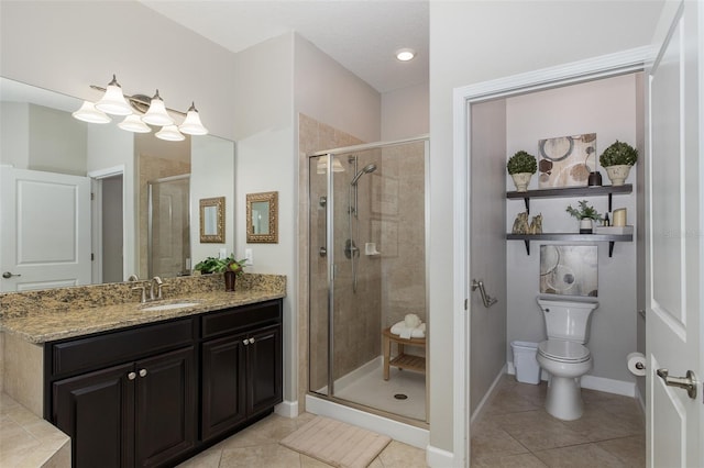 bathroom featuring an enclosed shower, tile patterned floors, and toilet