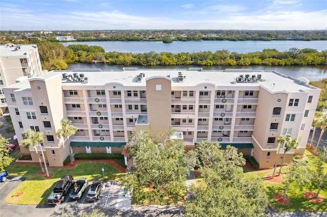 drone / aerial view with a water view