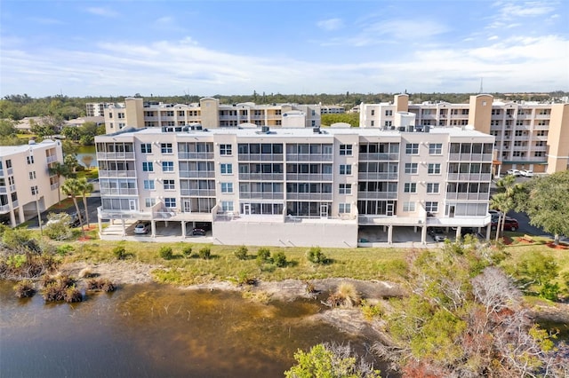 view of building exterior with a water view