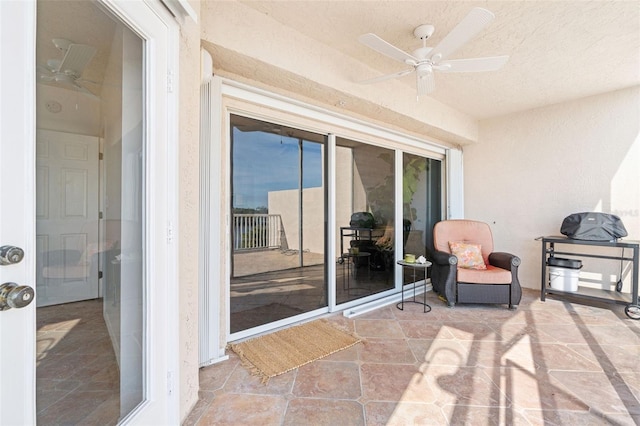 view of patio with ceiling fan