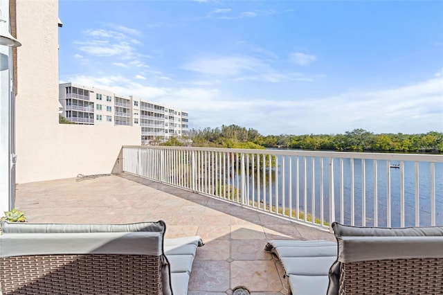 view of patio featuring a water view